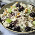 Low Carb Blackberry Cottage Cheese Chicken Salad served in a bowl with fresh blackberries, chicken, and herbs, perfect for a healthy meal.